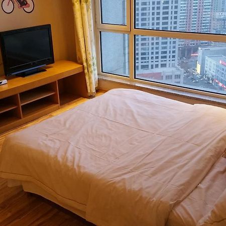 Dalian Yidian Yijing Huayuan Apartment Chambre photo