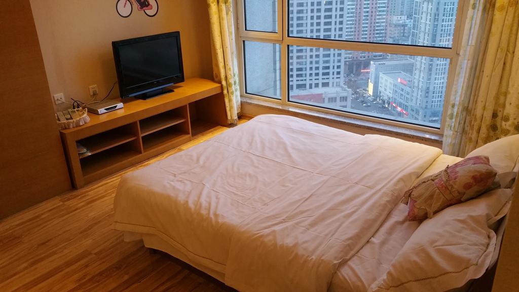 Dalian Yidian Yijing Huayuan Apartment Chambre photo