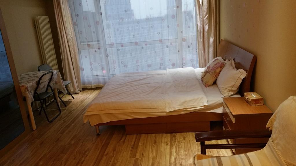 Dalian Yidian Yijing Huayuan Apartment Chambre photo